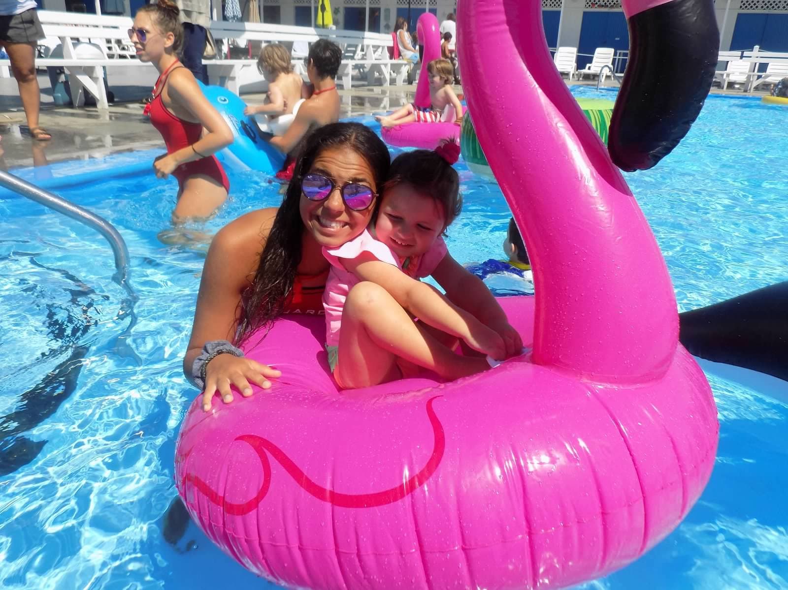 Families in the Olympic-sized heated pool at The Sands on a summer afternoon
